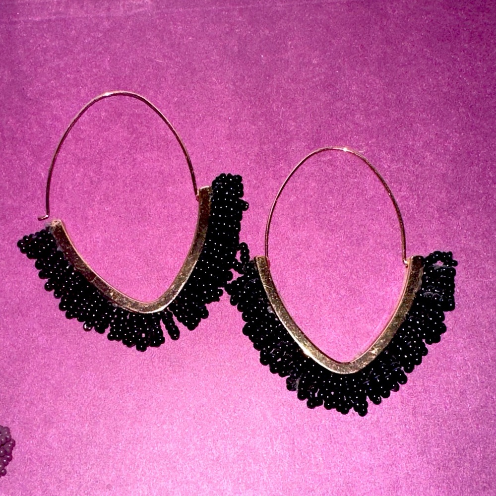 Gold with black beads